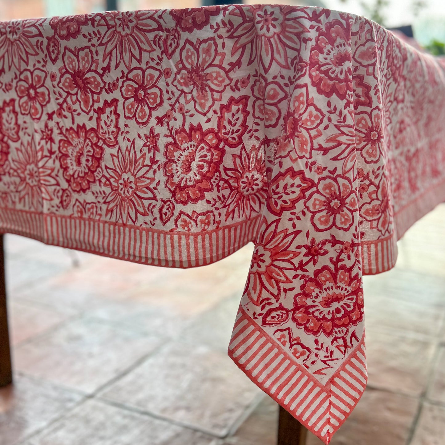 constance-and-denny-coral-meadow-tablescape-tablecloth-dressed-table-corner-detail