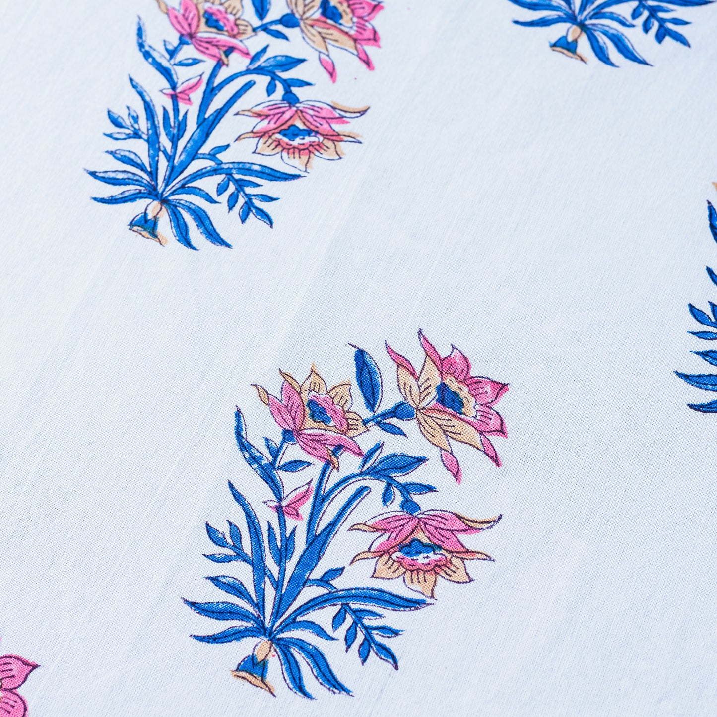 Floral embroidery pattern with pink and blue flowers on a white background. FLORAL-GREEN-INDIGO-STEM