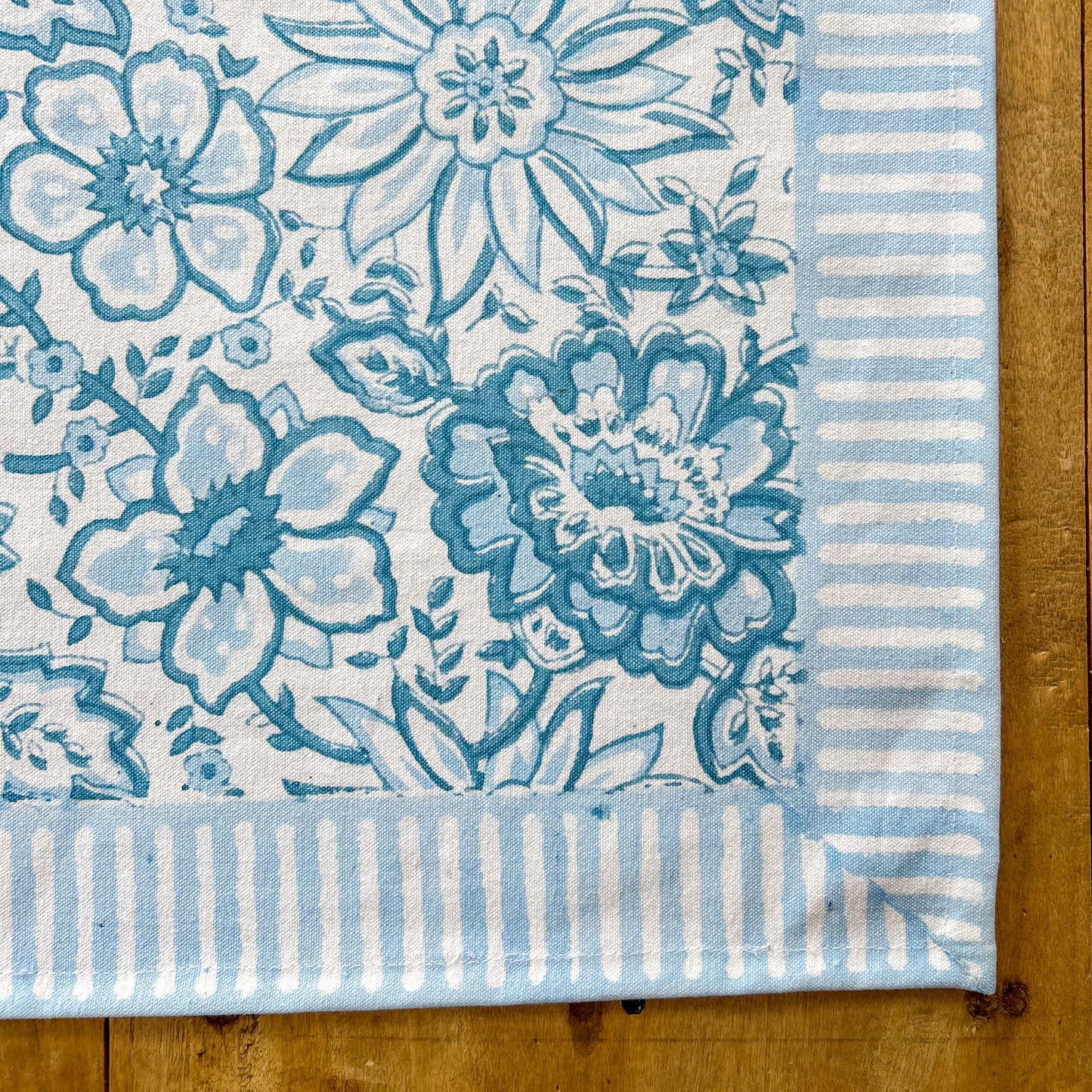 constance-and-denny-meadow-bloack-printed-table-runner-baby-blue-corner