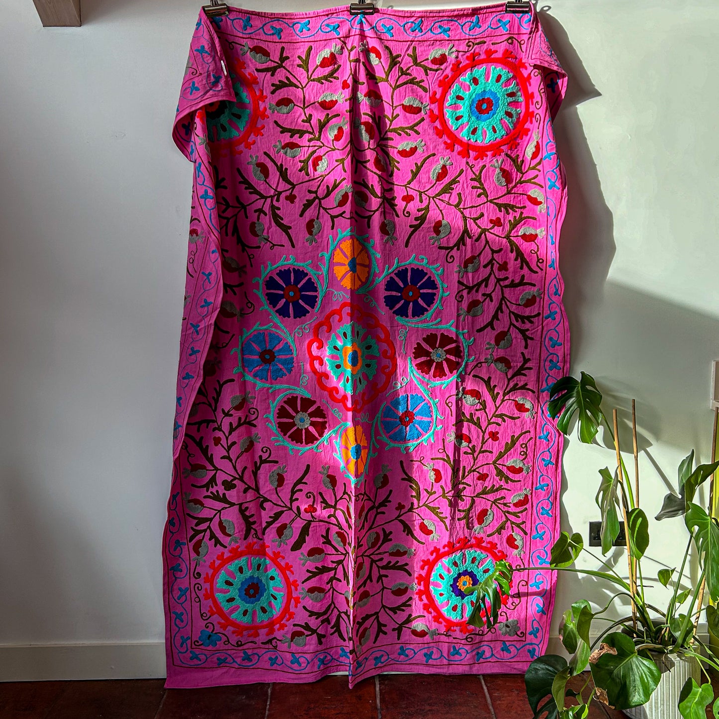 suzani-stitched-wall-hanging-bedspread-traditional-colours-pink-mauve-detail-pattern