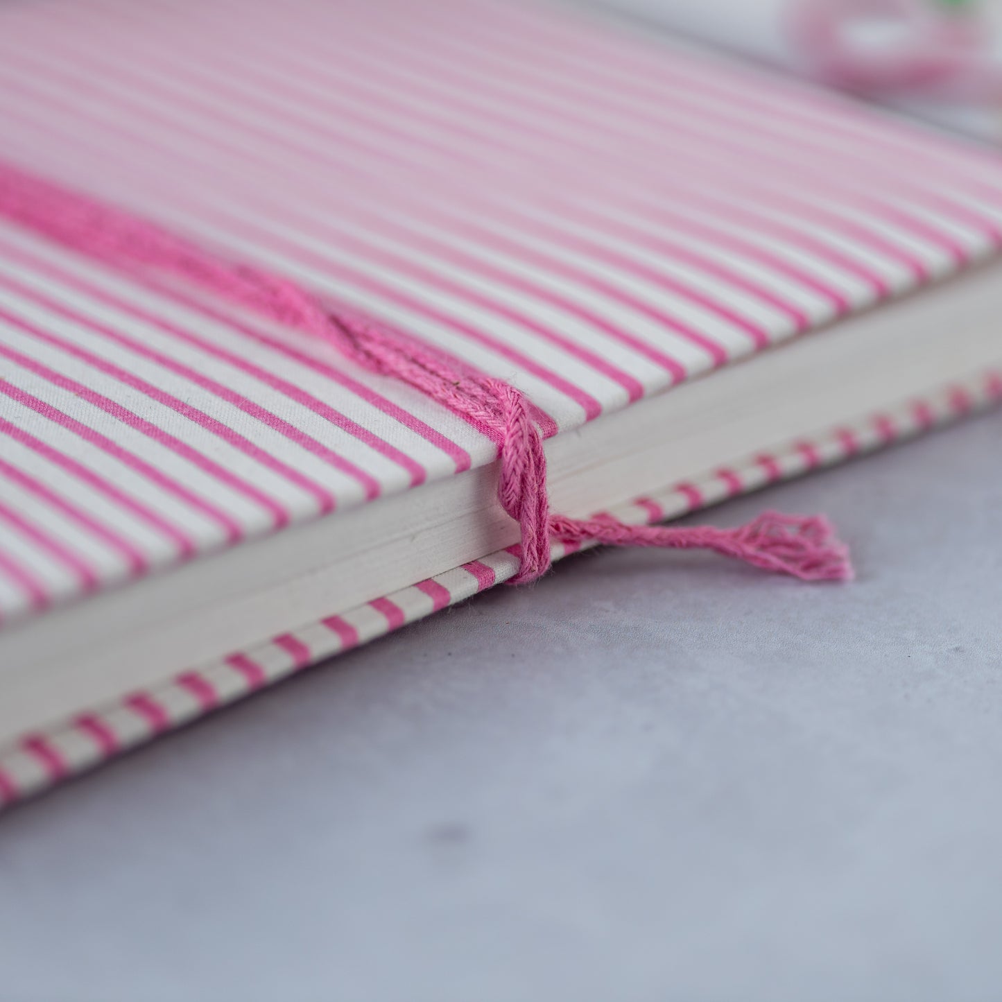 constance-and-denny-notebook-block-printed-handmade-paper-pink-stripe-side -detail