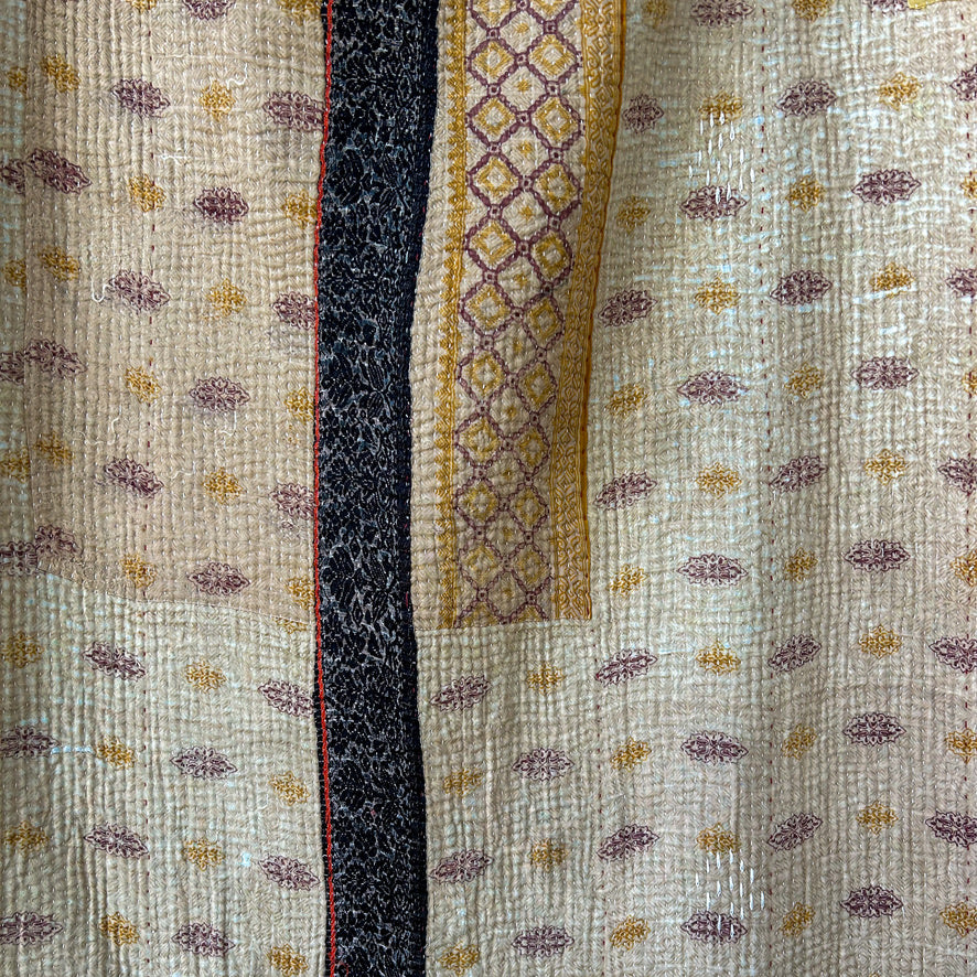 Close-up of textured fabric with geometric pattern. kantha-vintage-2031 - hand-made-blanket-throw-textiles-wall-hanging
