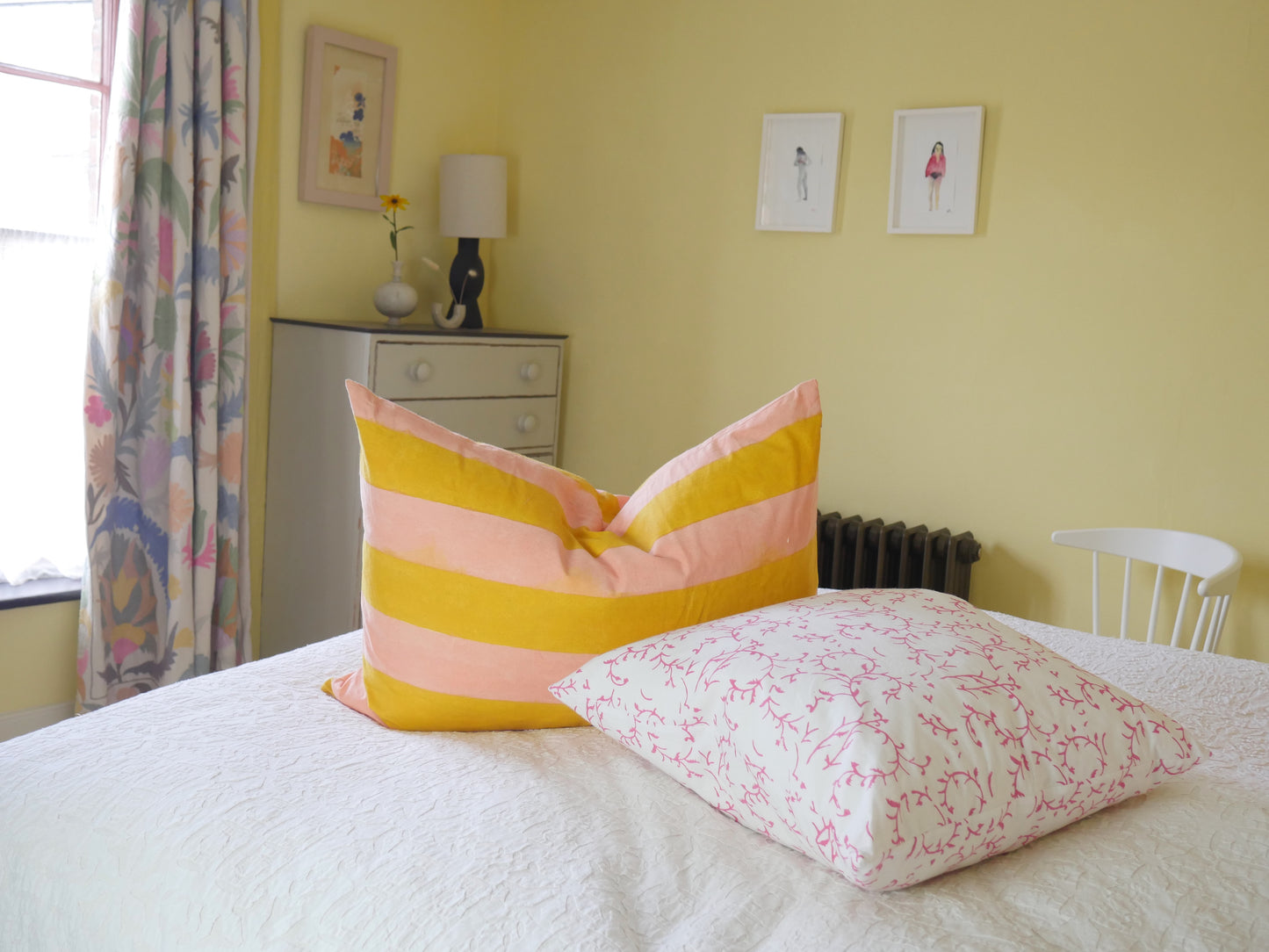 block printed cushion with feather pad
white background with pink