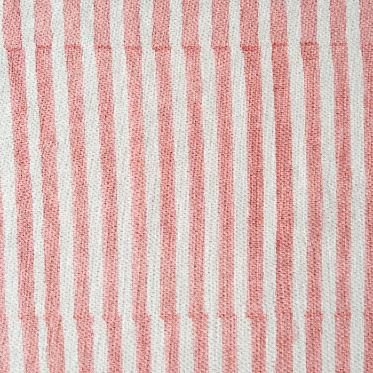 Fabric with pink and white vertical stripes