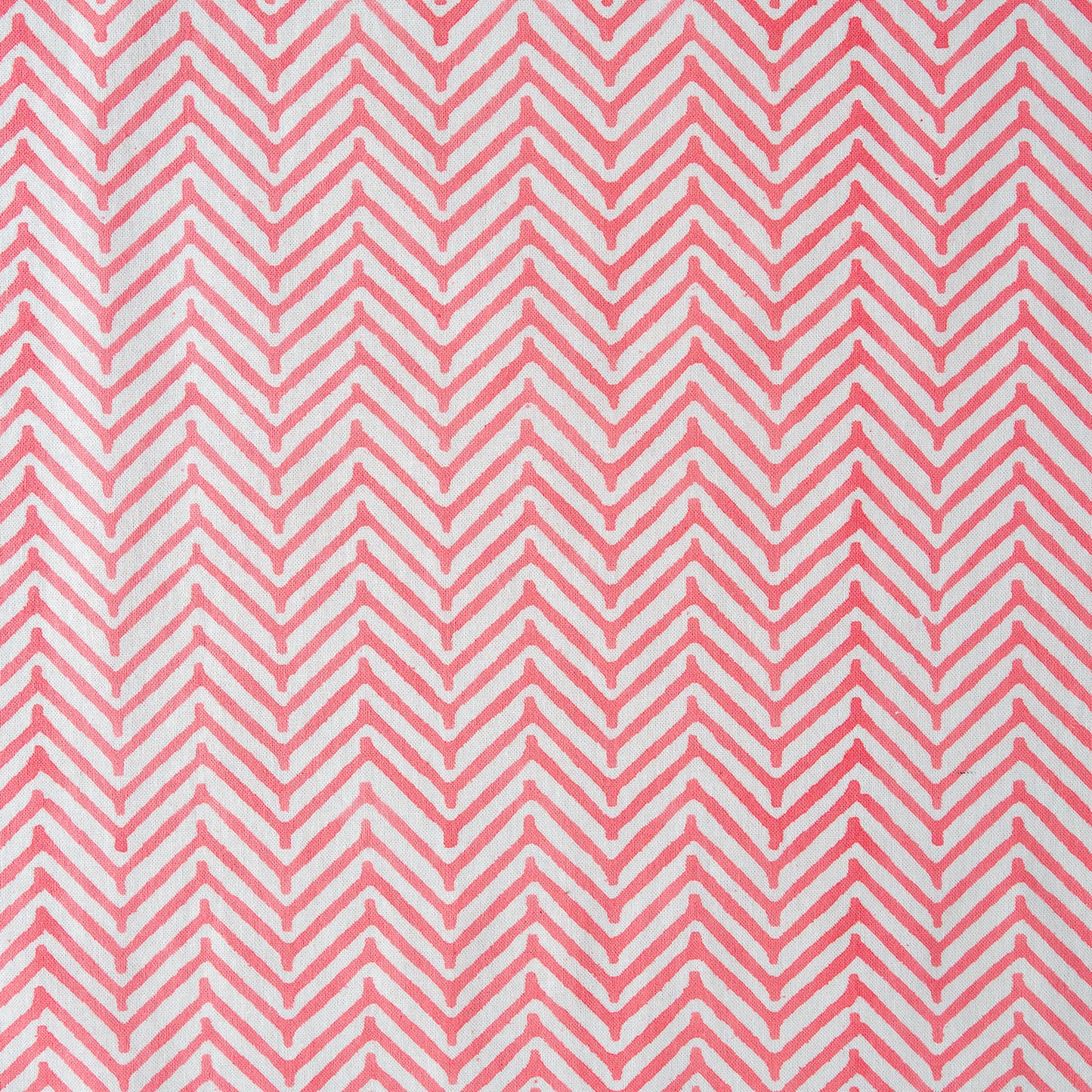 Pattern of red chevrons on a white background