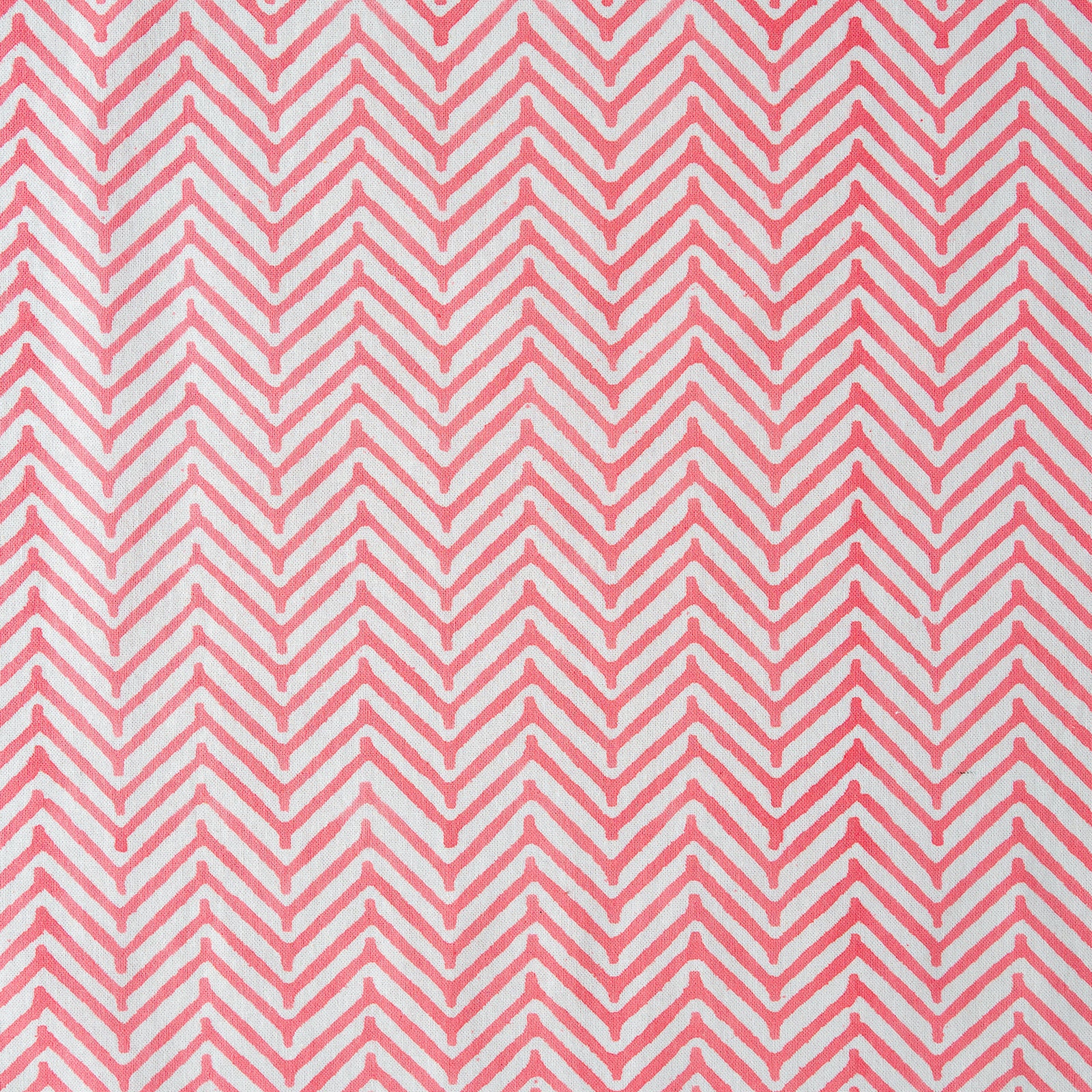 Pattern of red chevrons on a white background