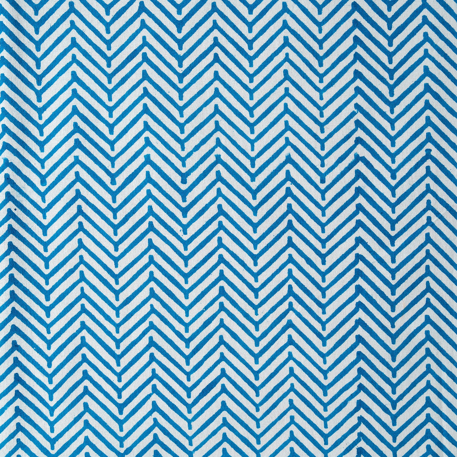 Blue and white chevron pattern on a textured background