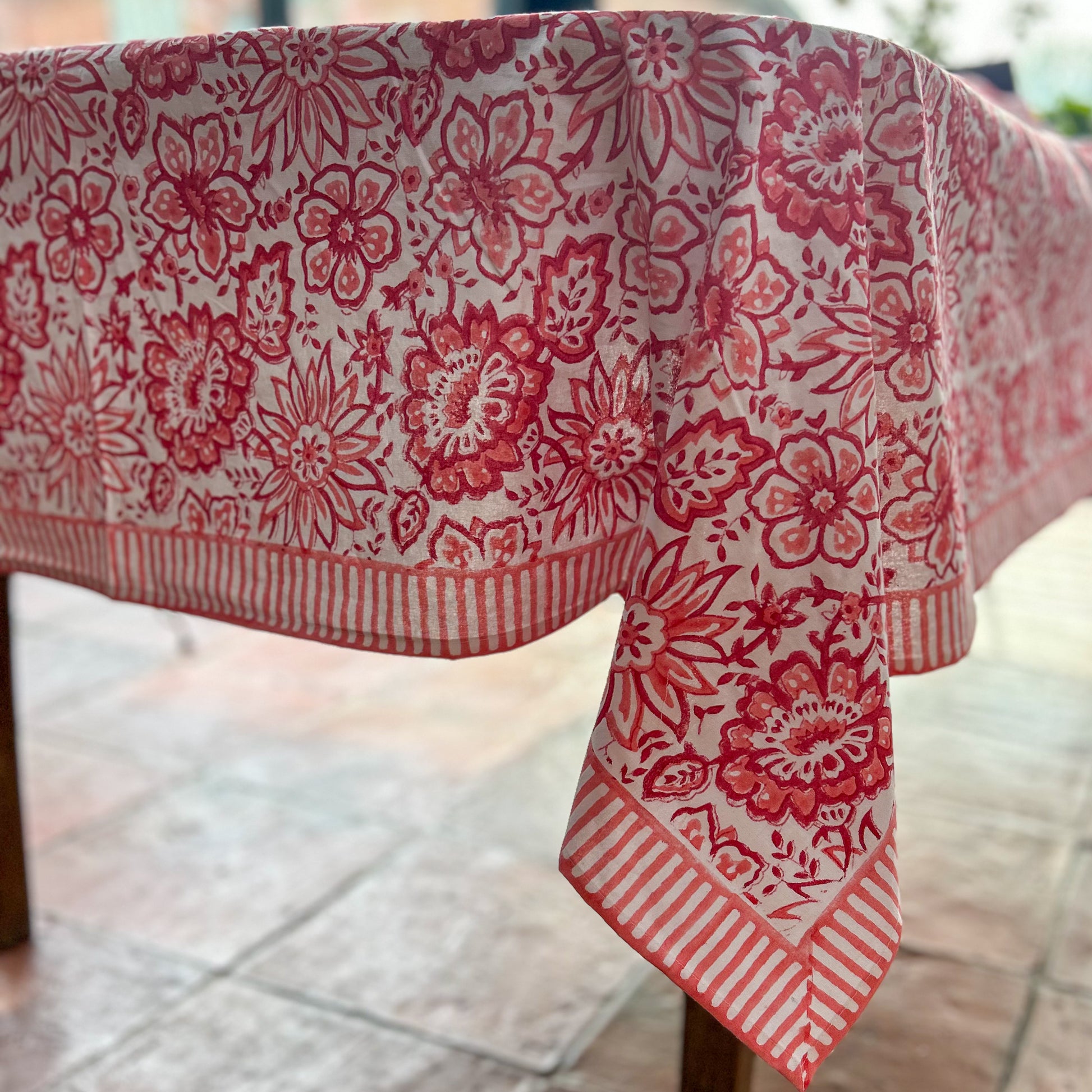 constance-and-denny-coral-meadow-tablescape-tablecloth-dressed-table-corner-detail