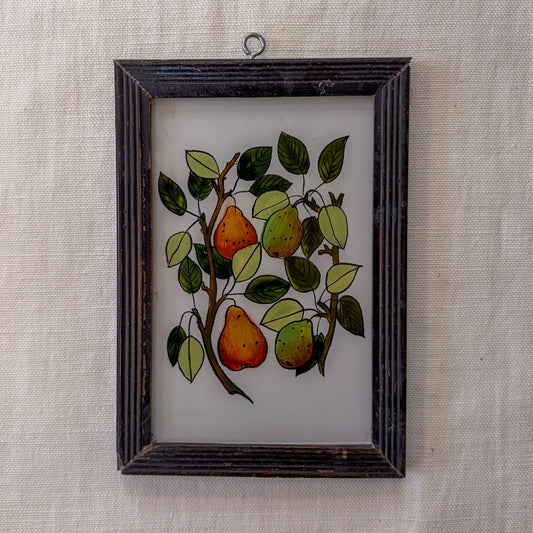 Framed artwork of pears and leaves on a textured beige background