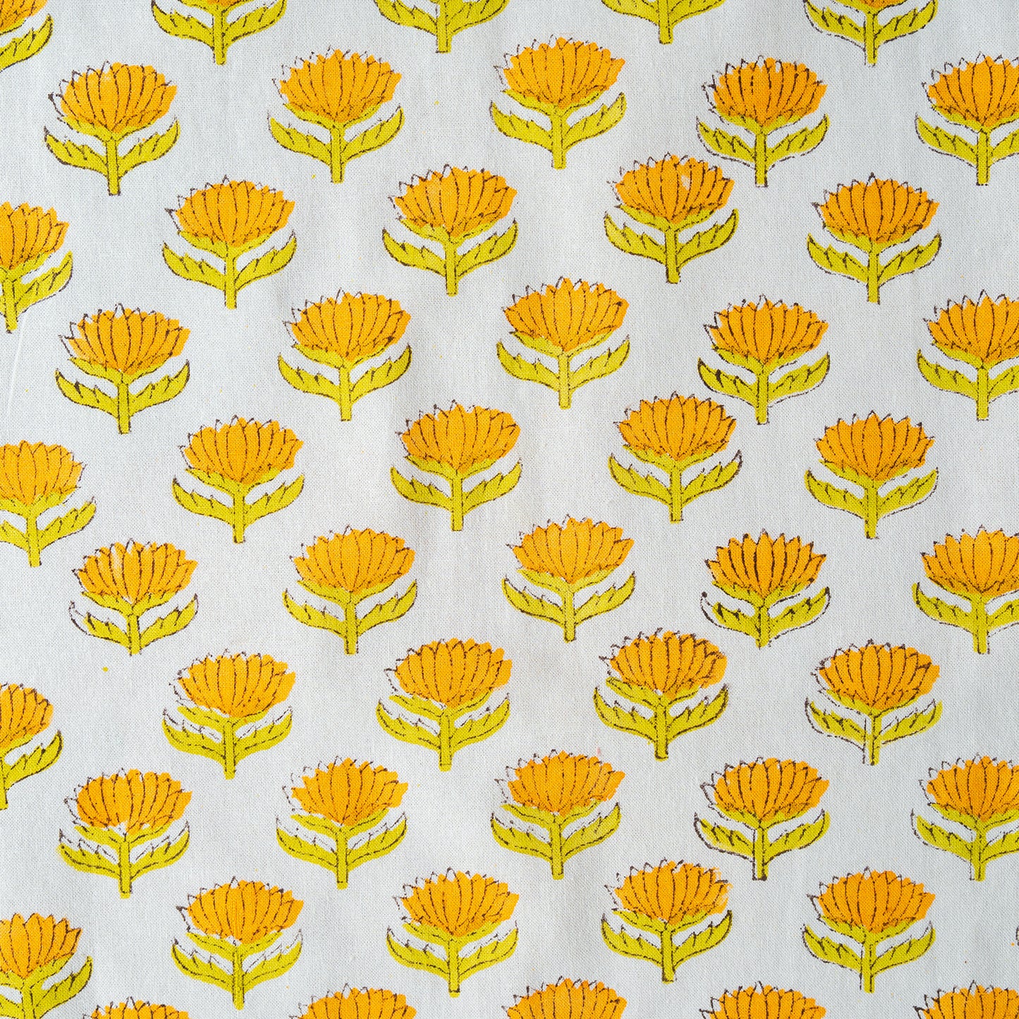 Pattern of yellow flowers on a light gray background