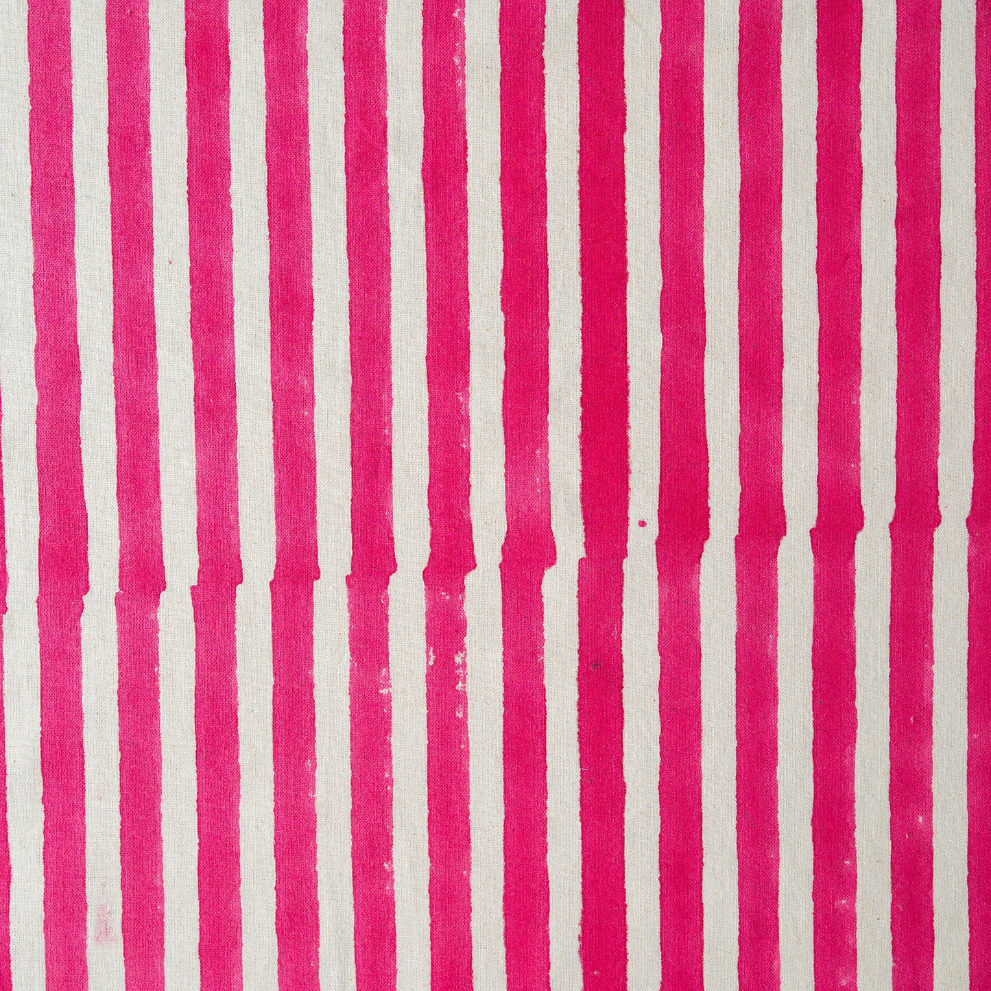 Pattern of vertical pink stripes on a white background