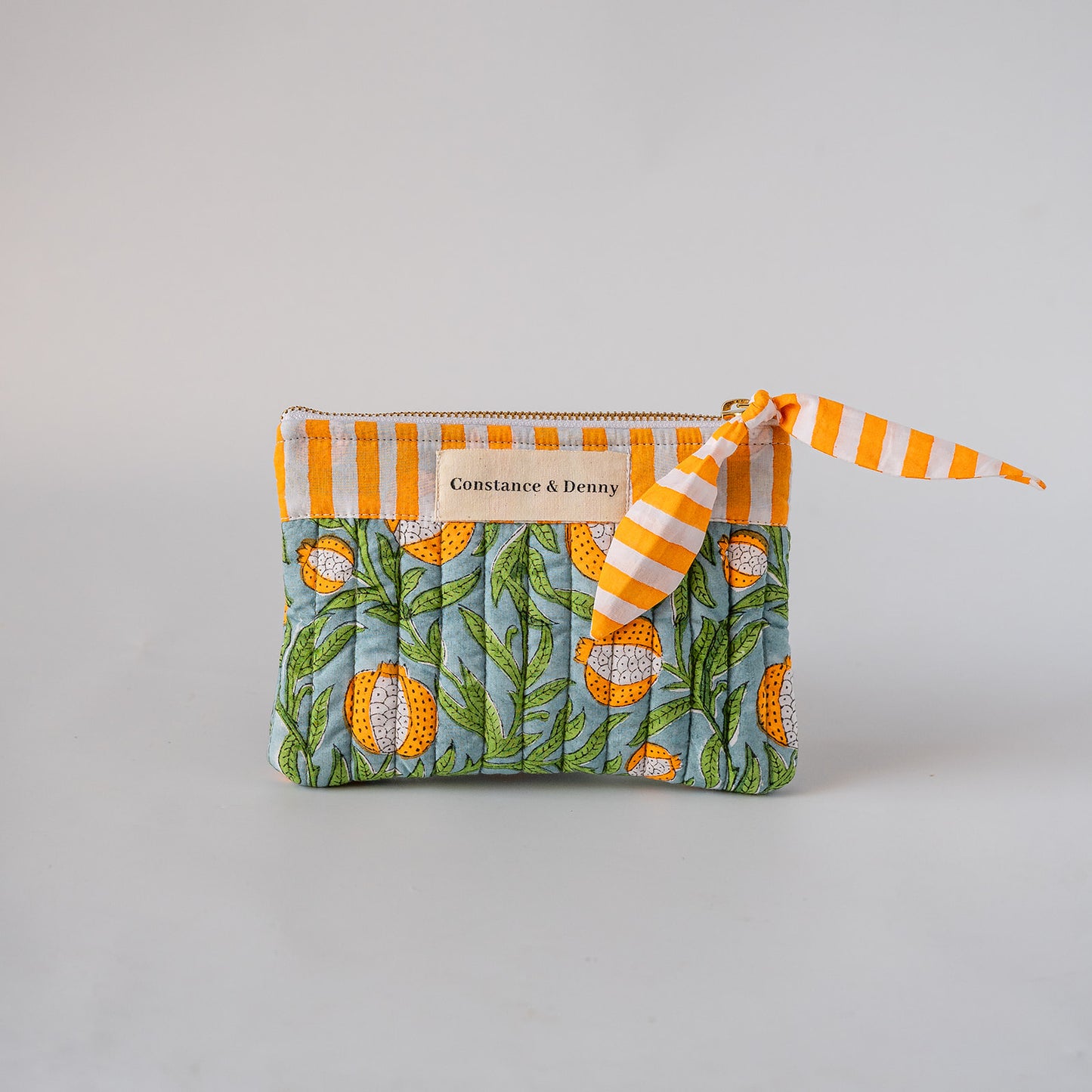 quilted block print zip pouch. stripes and pomegrante.