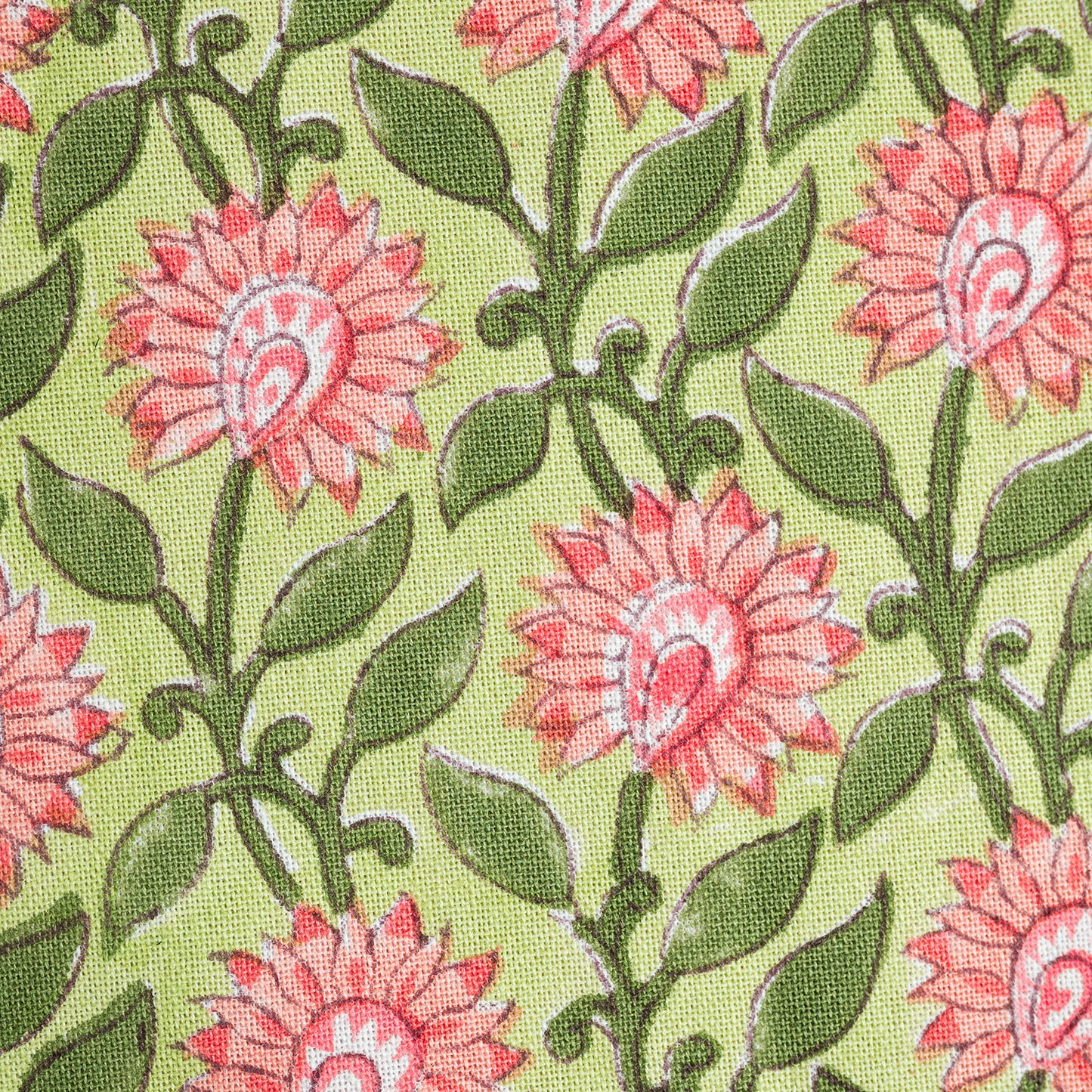 Close-up of floral pattern with pink flowers and green leaves on a green background