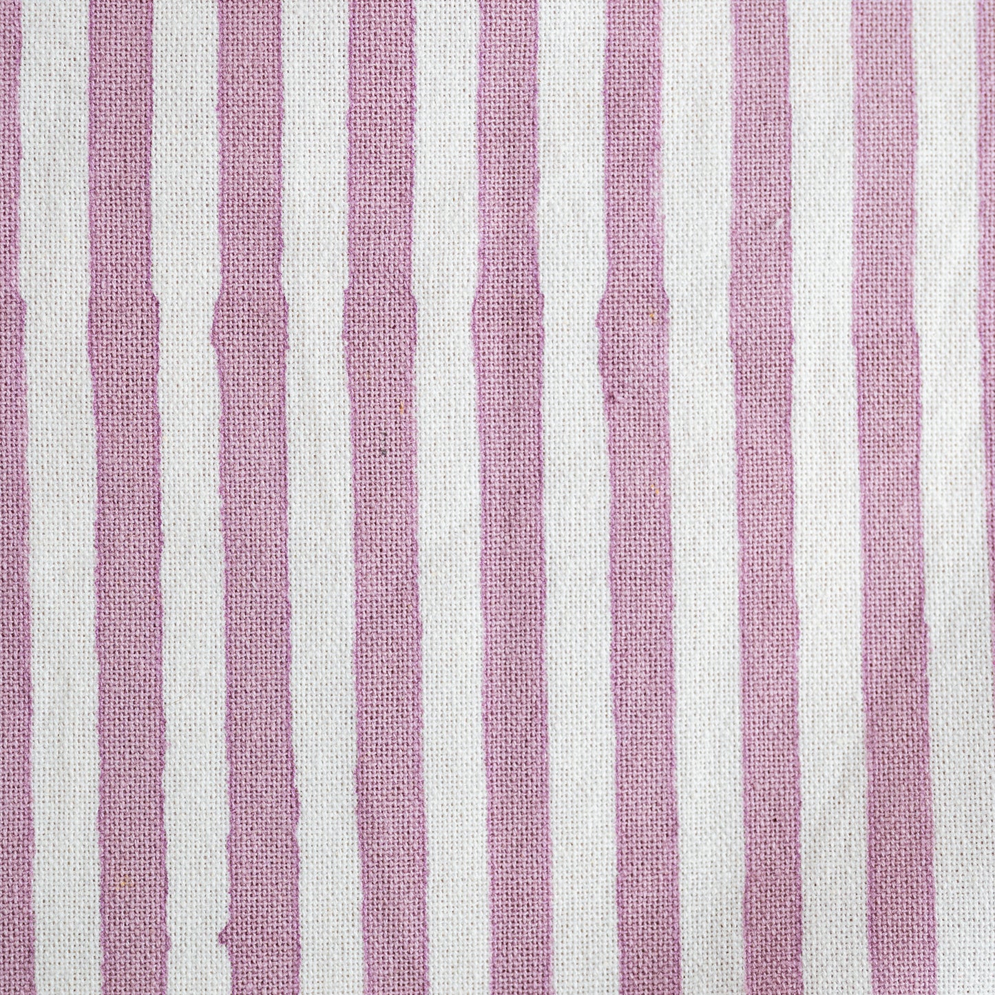 Fabric with pink and white vertical stripes