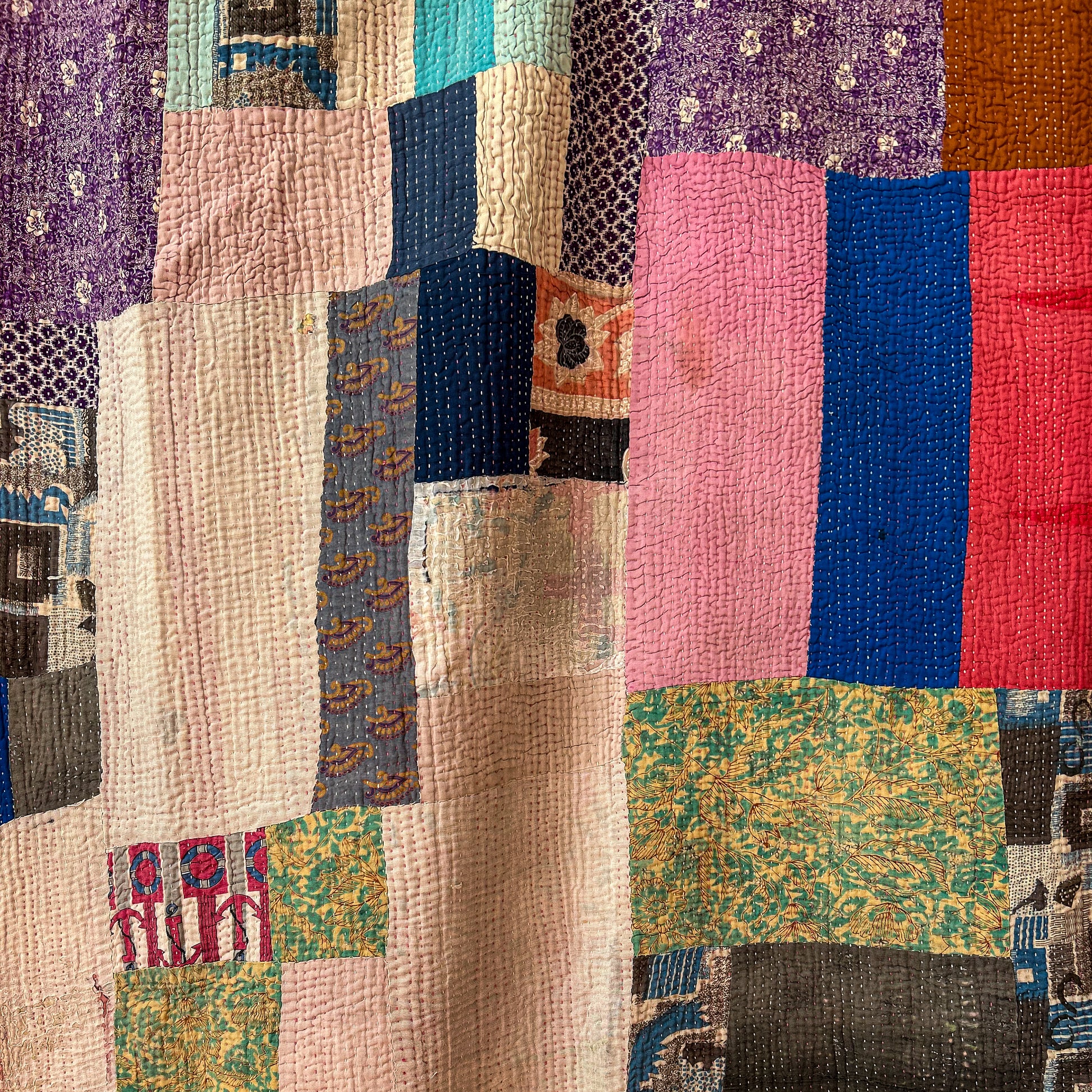 Patchwork quilt with multicolored fabric squares. Vintage-kantha-2019-A-blanket-throw-detail