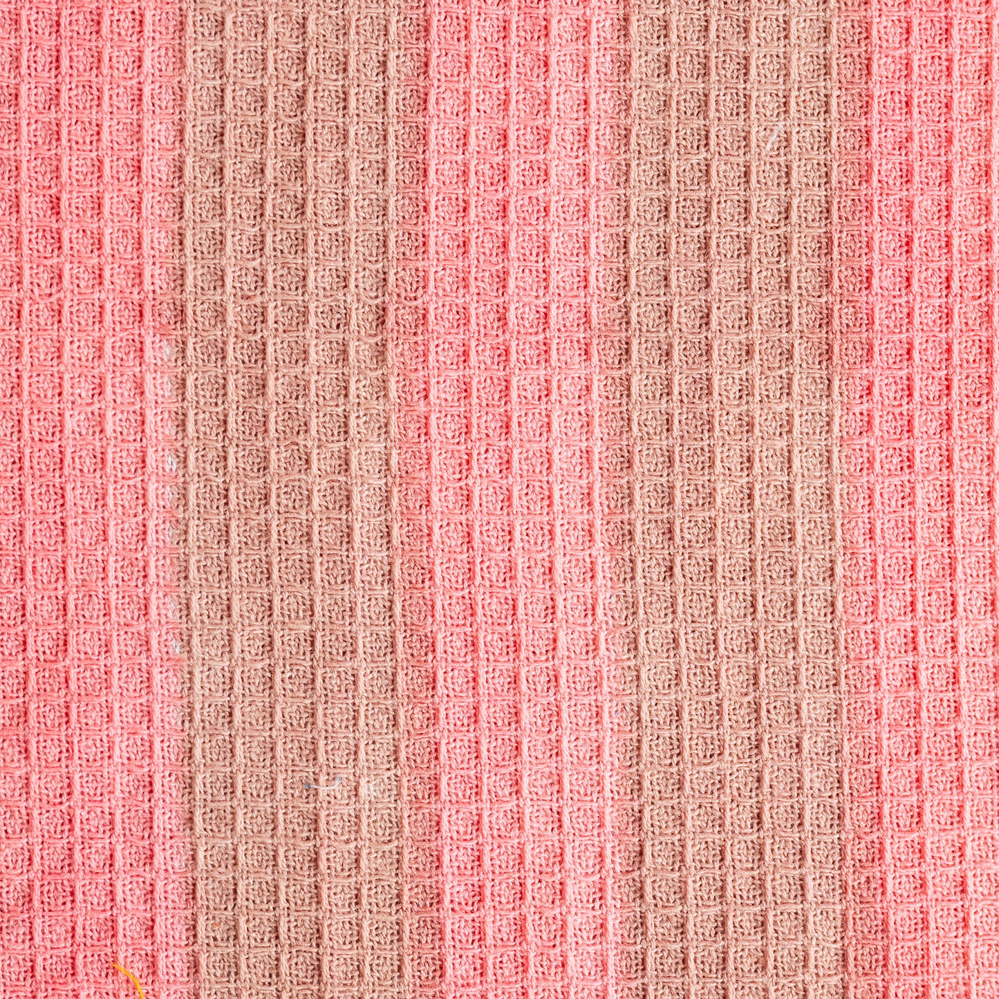 Woven fabric pattern with pink and beige colors