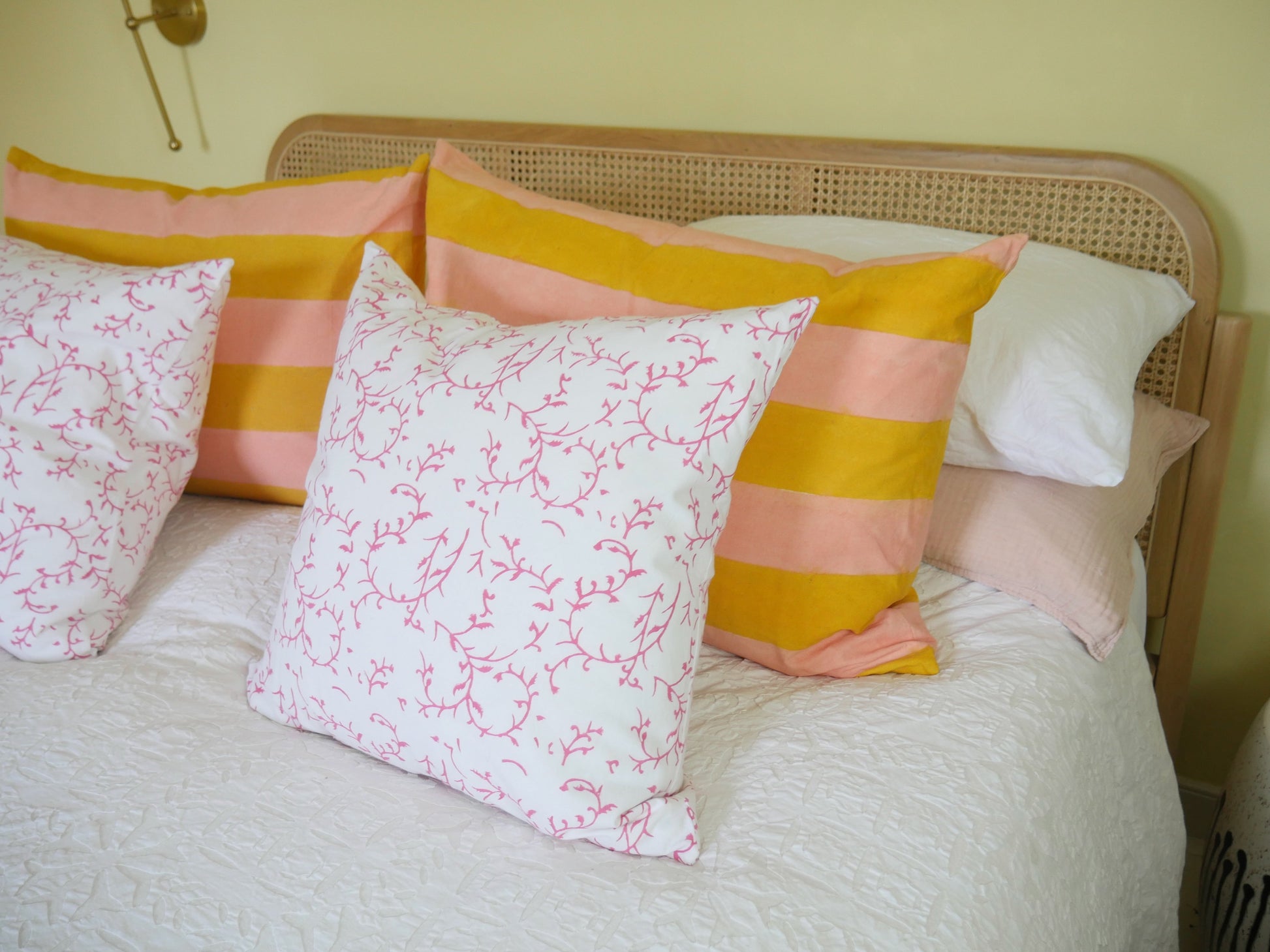 block printed cushion with feather pad
white background with pink