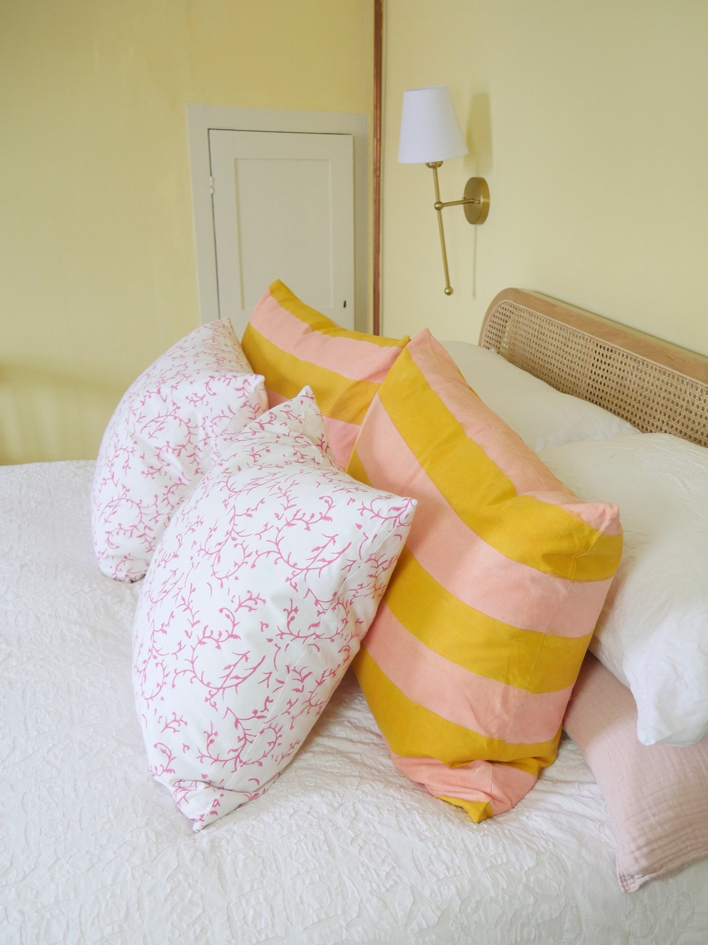 block printed cushion with feather pad
white background with pink