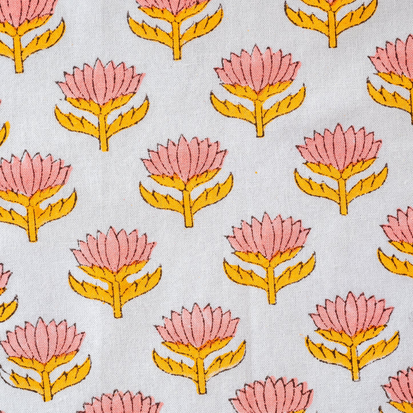 Pattern of pink and yellow flowers on a light blue background. coral lotus flower 