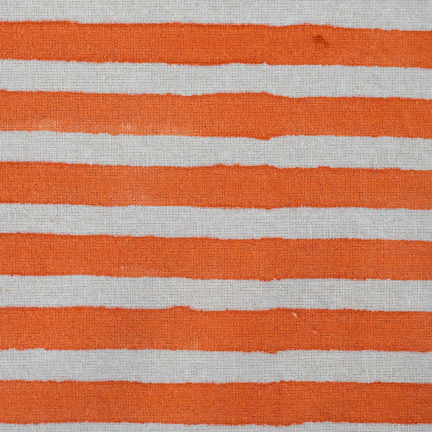 Textured fabric with horizontal orange and gray stripes