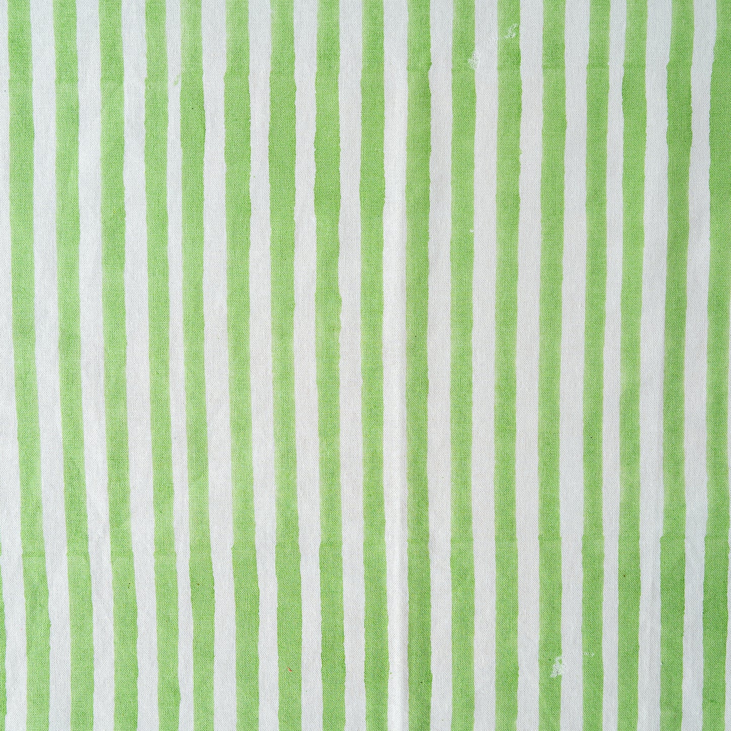 Close-up of green and white striped fabric texture
