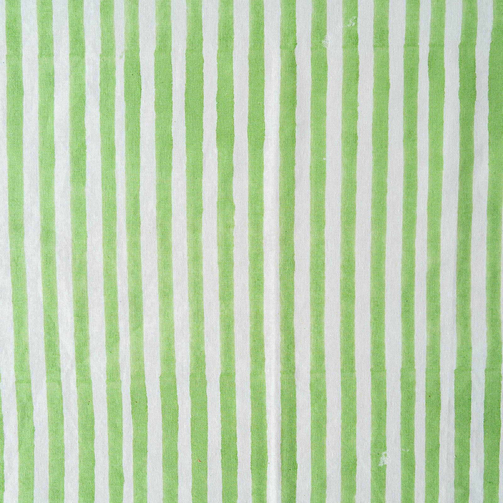 Close-up of green and white striped fabric texture
