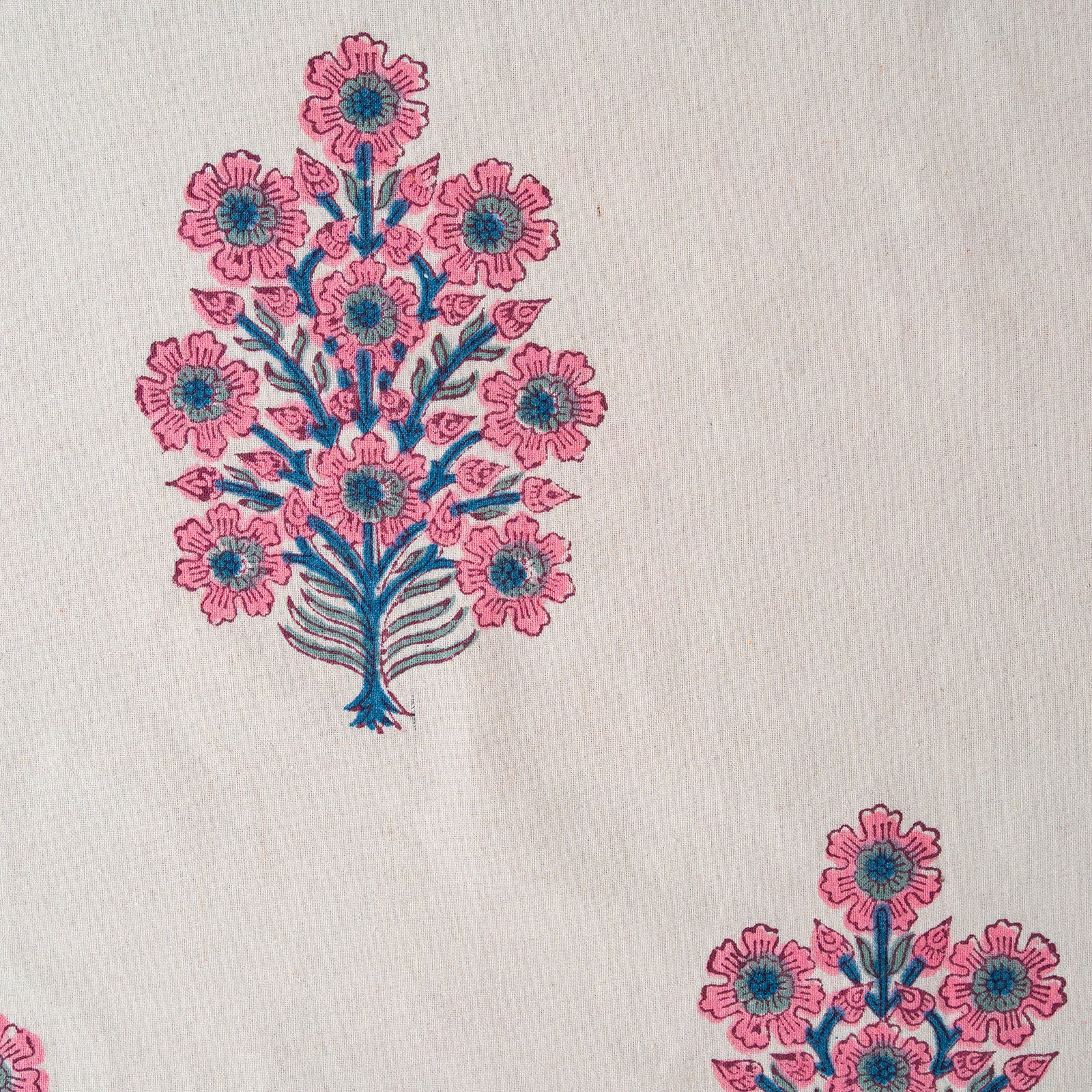 Floral embroidery design on a beige fabric background