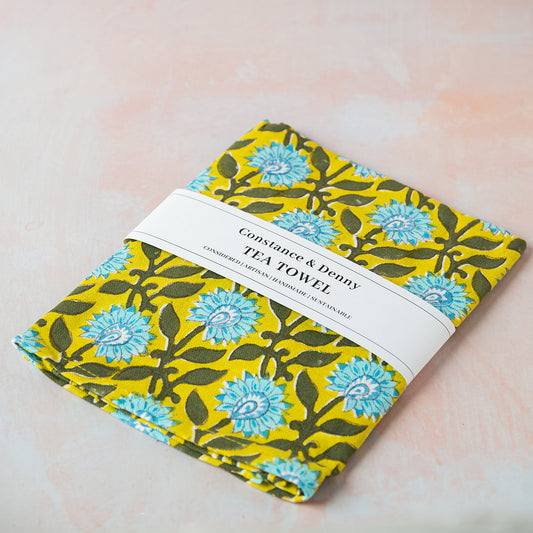 Tea towel with floral pattern on a light background