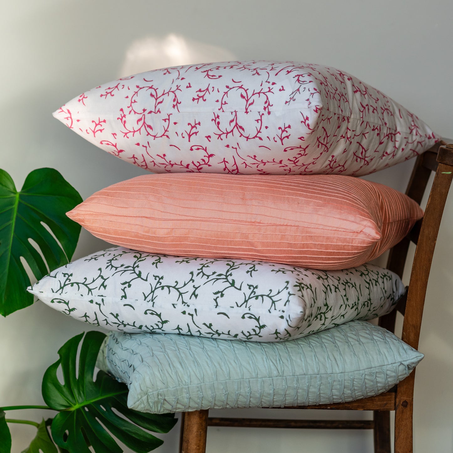 constance-and-denny-block-printed-floral-cotton-pink-green-cushion-stack-four