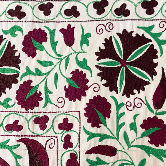 constance-and-denny-emerald-and-burgundy-suzani-corner