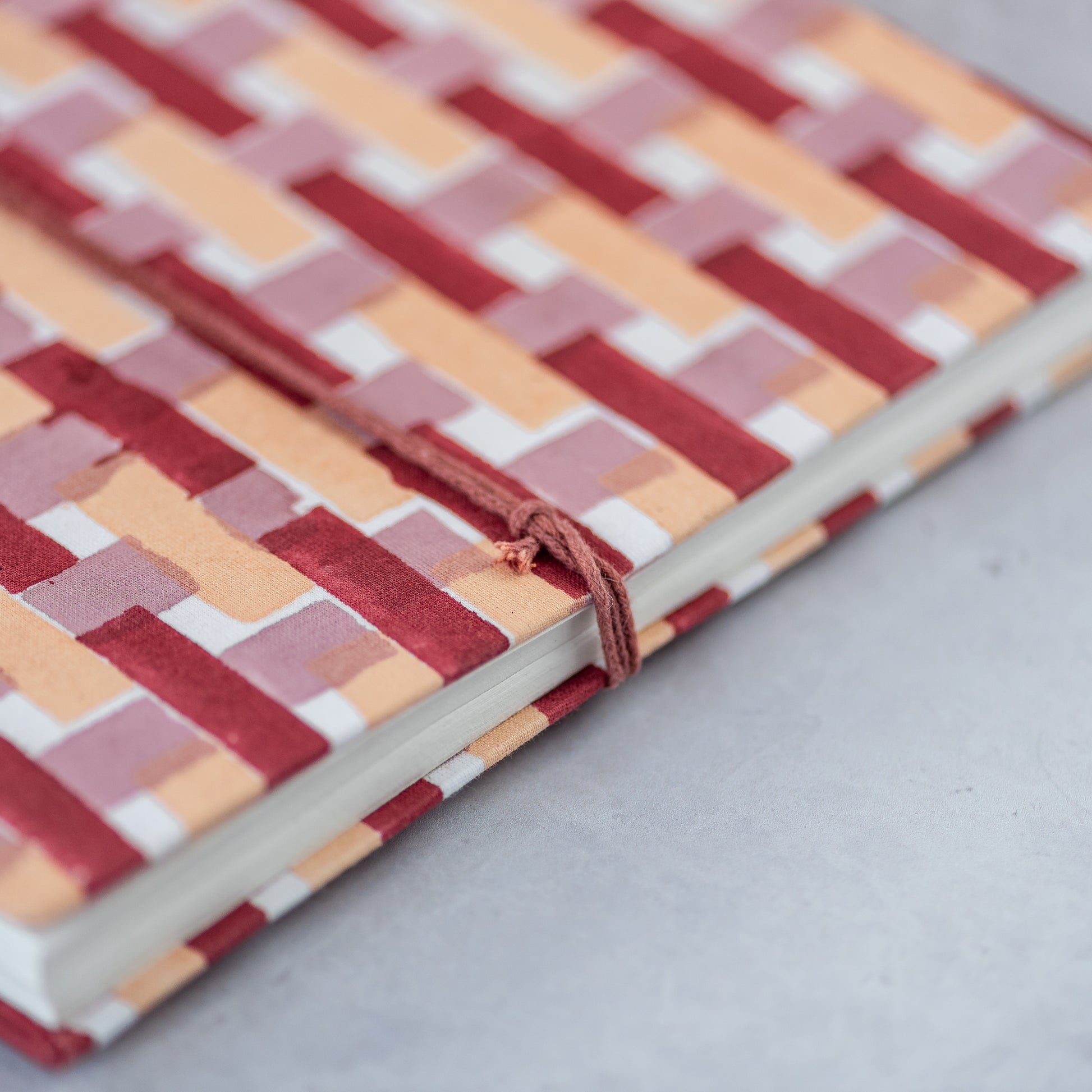 constance-and-denny-geometric-stripe-notebook-block-printed-handmade-paper-side-detail