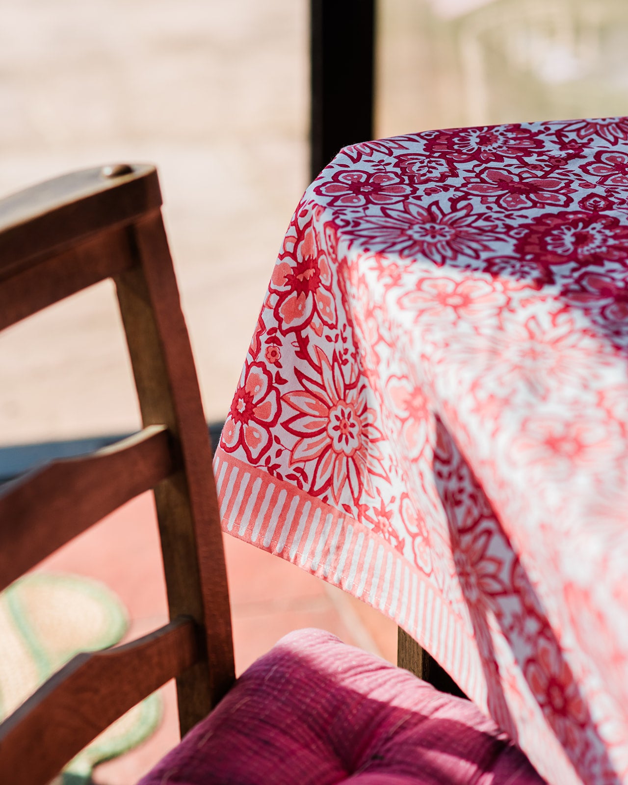 constance-and-denny-coral-meadow-tablescape-tablecloth-dressed-table-detail