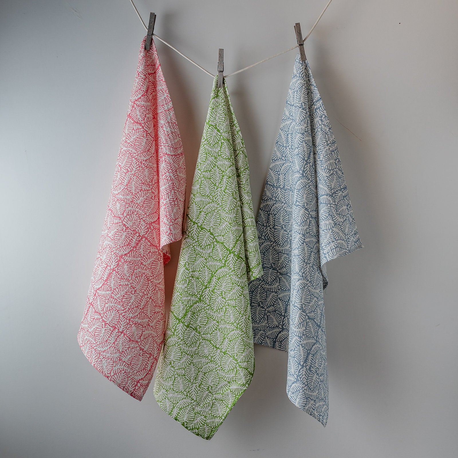 leaf-block-printed-green-lime-begonia-airy-blue-tea-towel