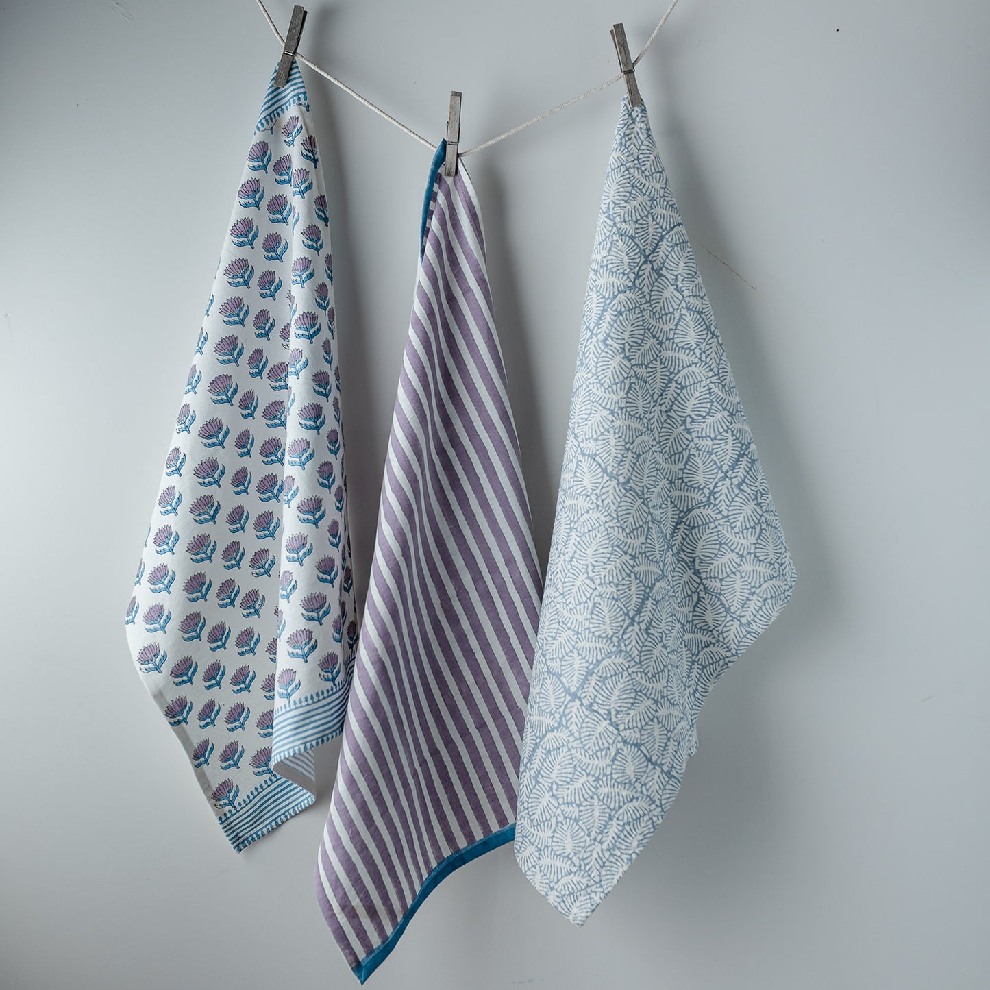 lotus-flower-stripe-leaf-block-printed-airy-blue-tea-towel-trio-hanging