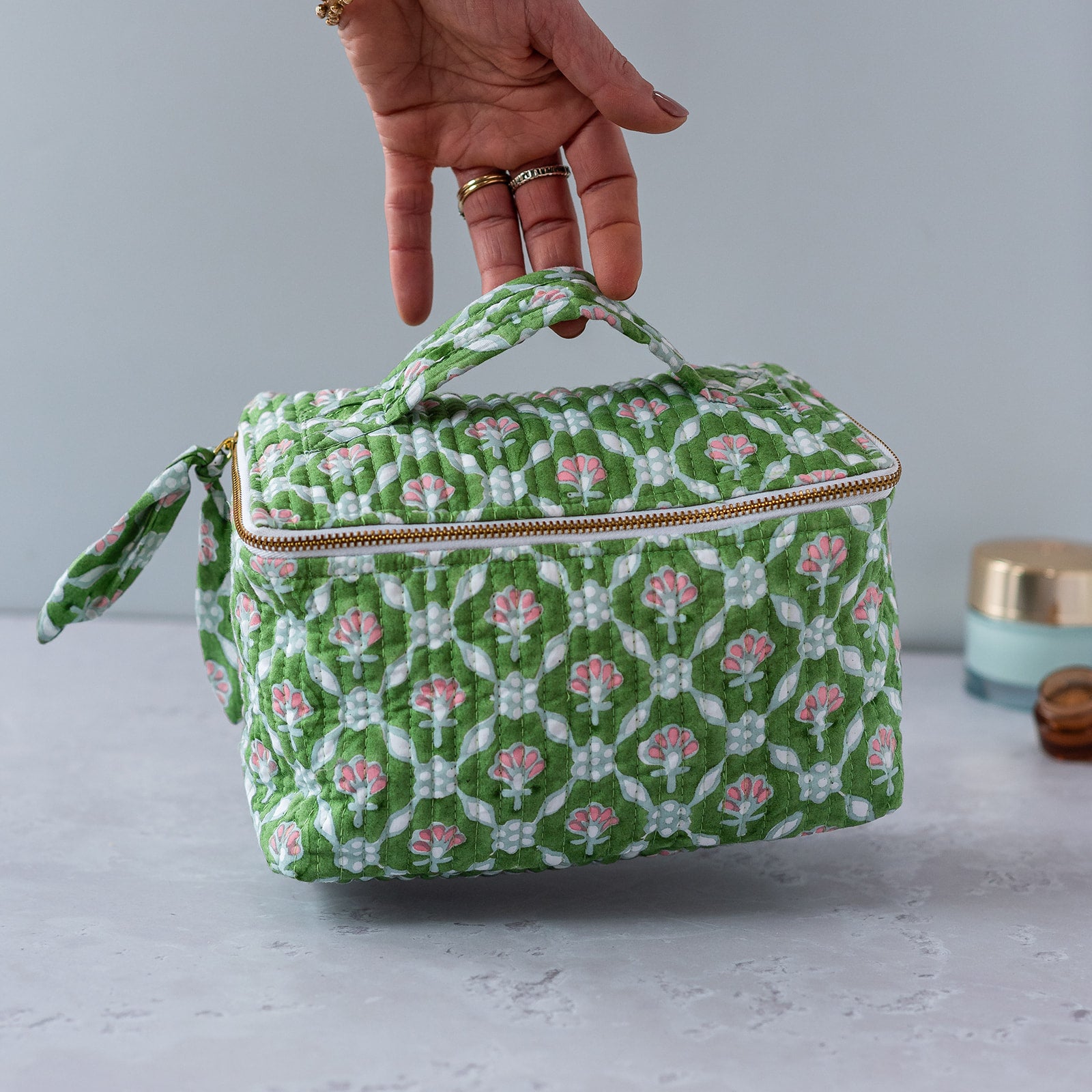 petal-cosmetic-case-block-printed-green-make-up-bag-handle