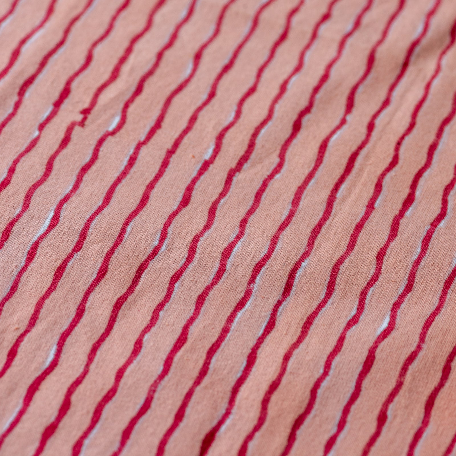 wiggle-line-napkins-block-printed-pink-detail-strawberry