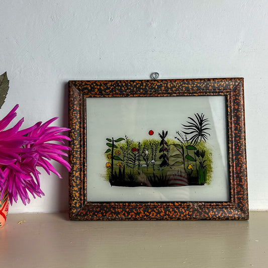 Framed artwork with nature-themed design of jungle