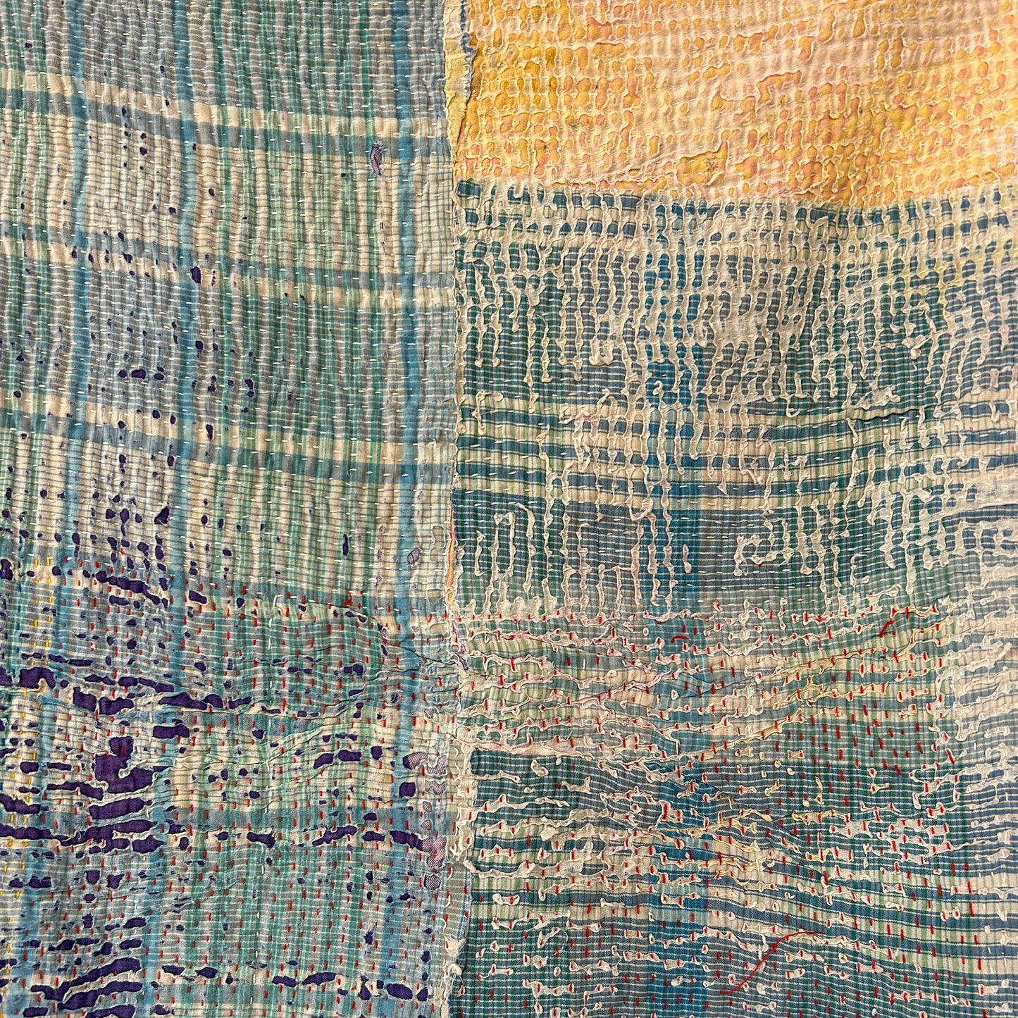 Textured fabric with a mix of blue, green, and yellow colours. kantha-vintage-2032 - hand-made-blanket-throw-textiles-wall-hanging