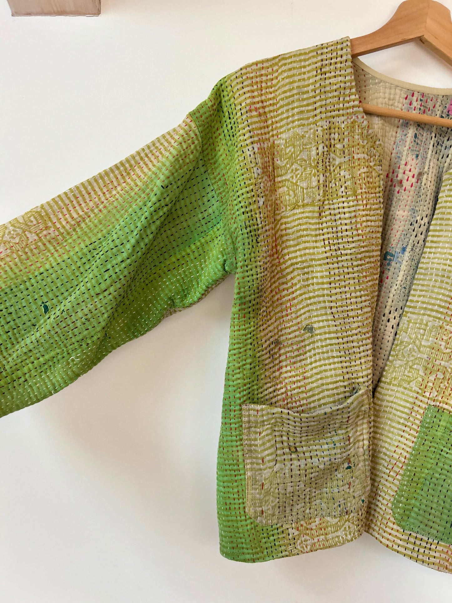 Green textured jacket on a white background. vintage-kantha-jacket-chartreuse-47-handmade