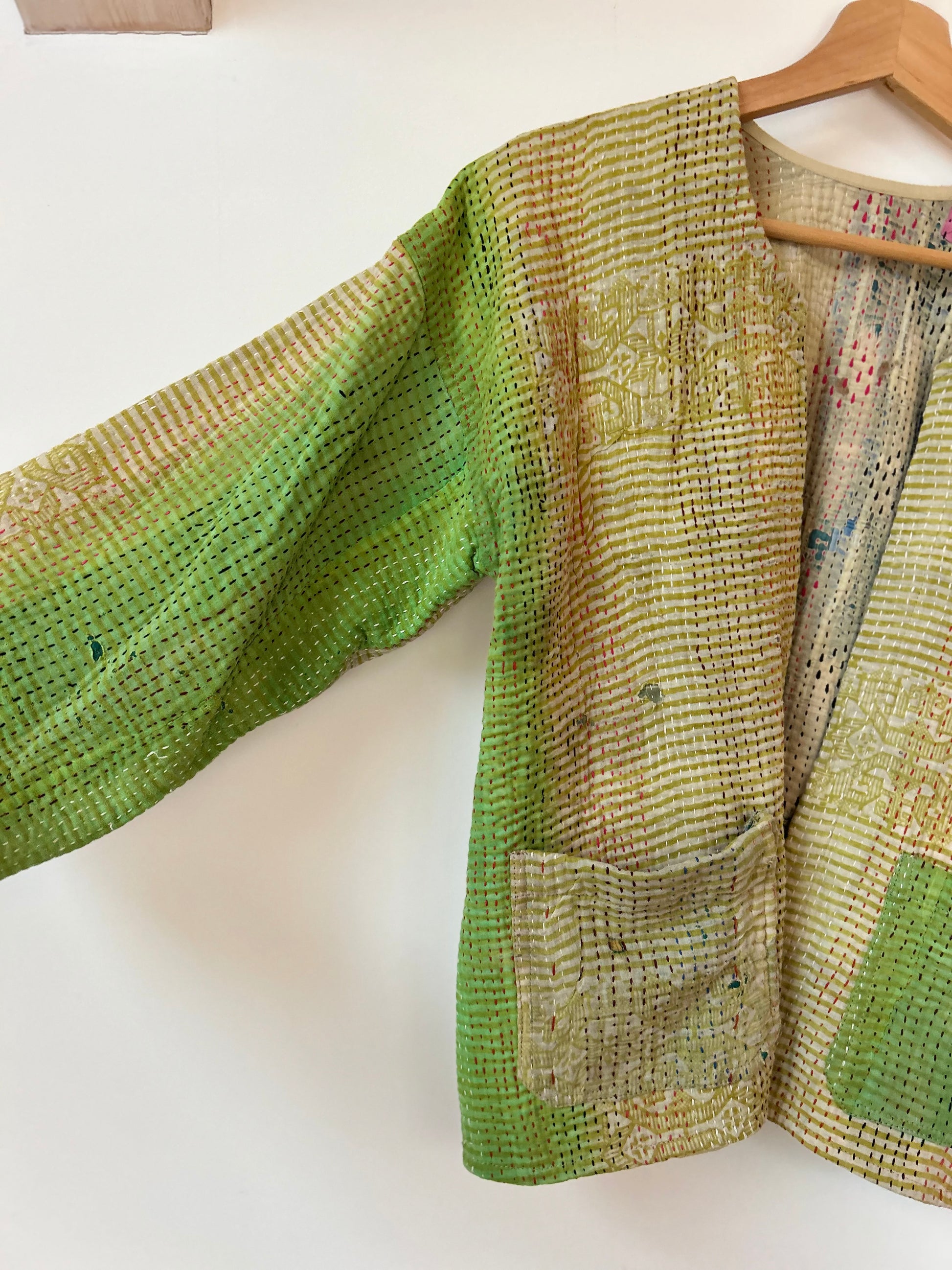 Green textured jacket on a white background. vintage-kantha-jacket-chartreuse-47-handmade