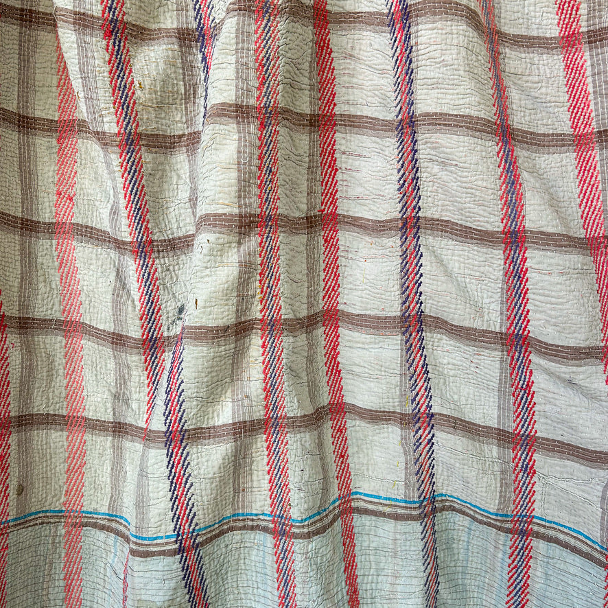 Plaid fabric with red, blue, and brown stripes on a beige background. kantha-vintage-2030 - hand-made-blanket-throw-textiles-wall-hanging
